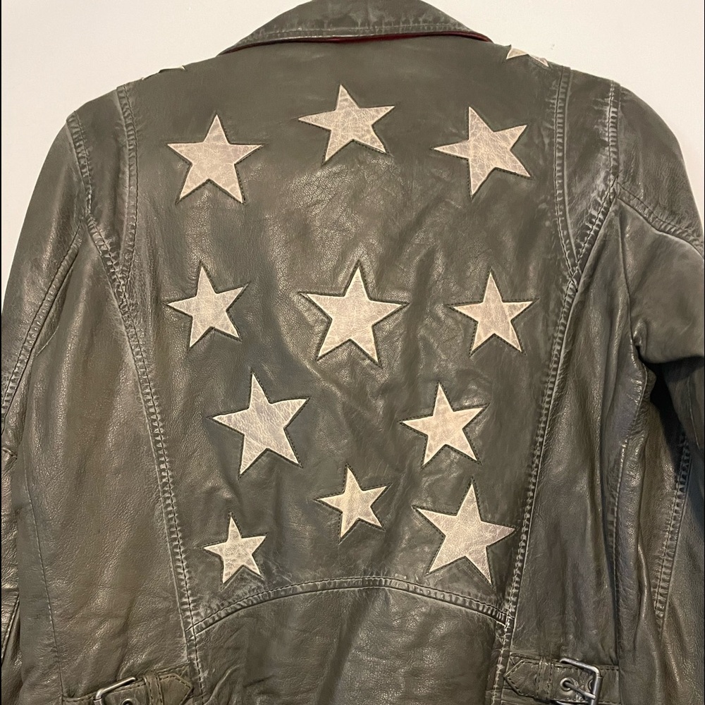 Vegan Motorcycle jacket with stars in the back.